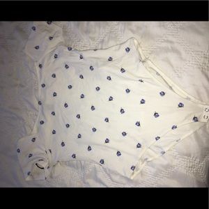 Ivory bodysuit with blue roses